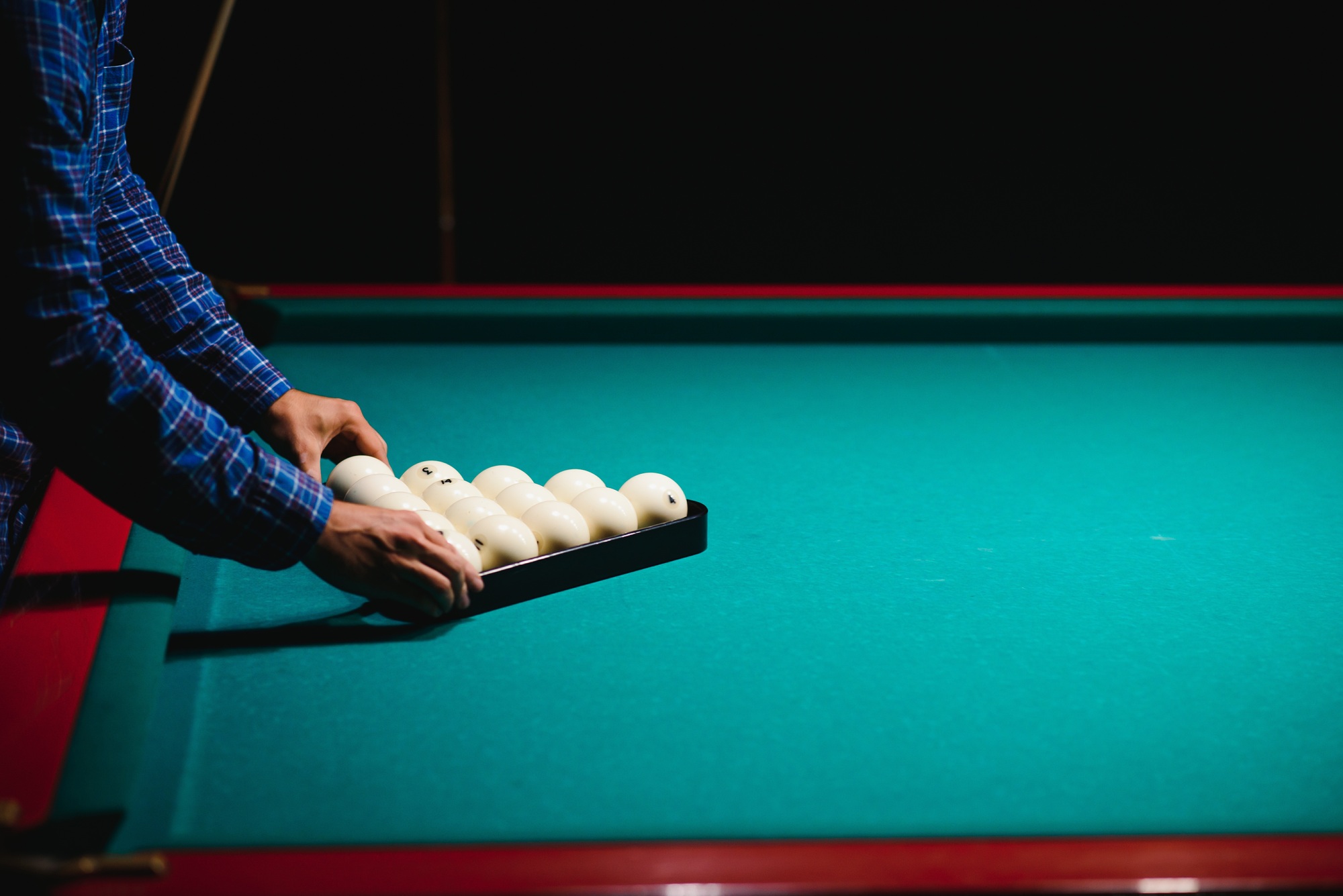 Playing billiard - Close-up shot of a man playing billiard